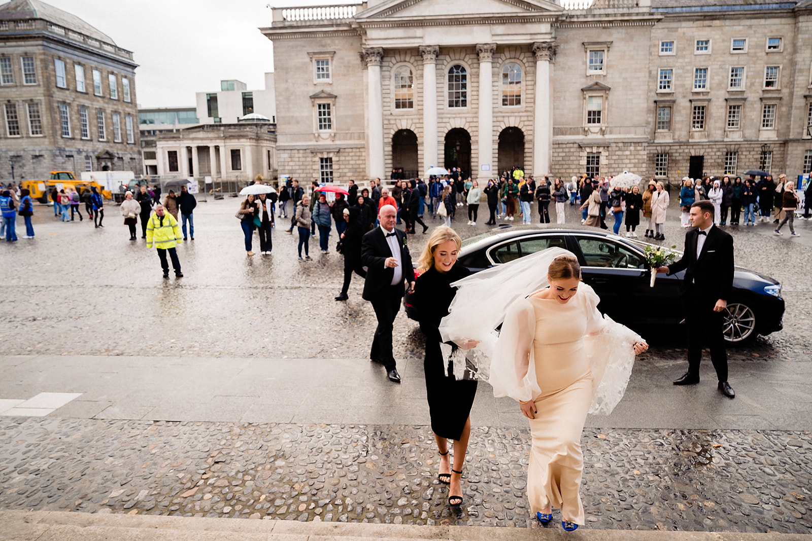 bride arriving at trinity college chapel in dublin