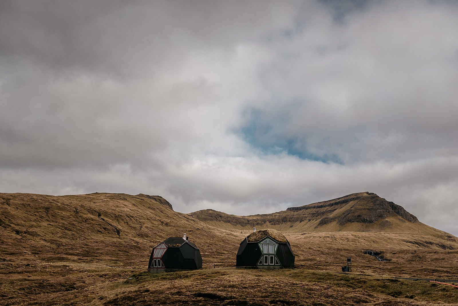 Cube cabins in remote mountain landscape