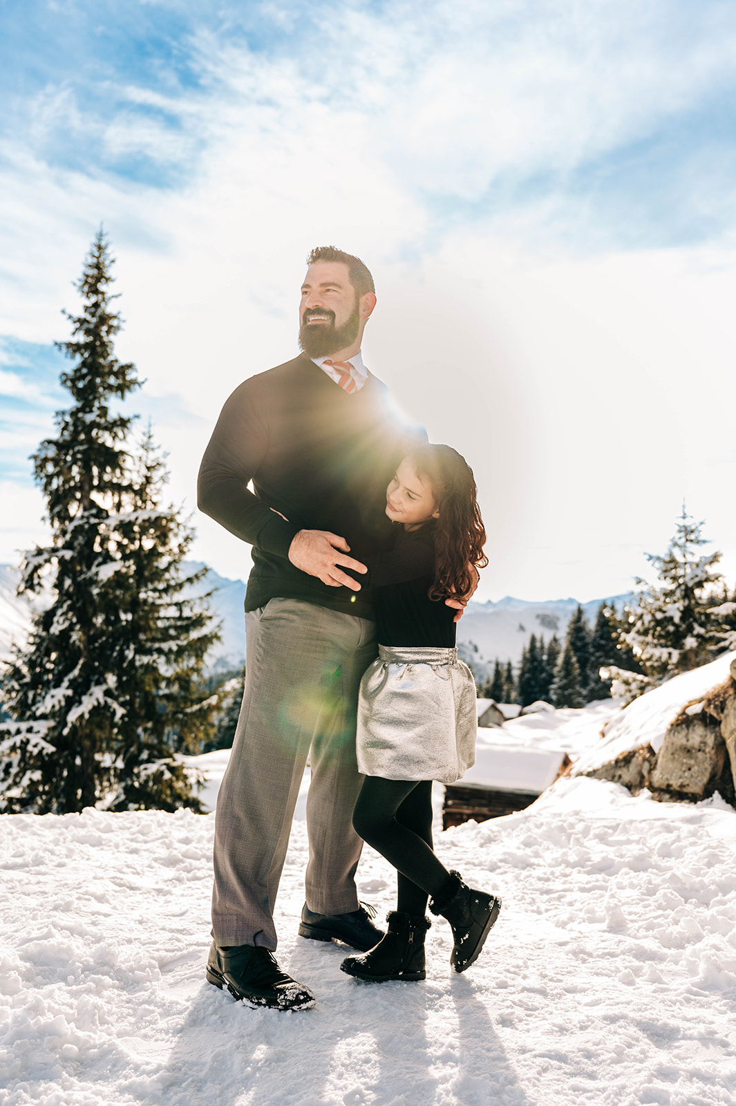 Father and Daughter Sunflare Swiss Alp Winter Snow Family Photos