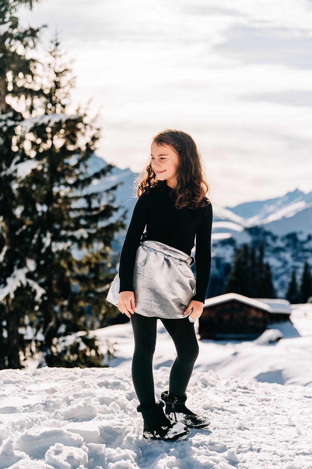 Young Girl Portrait in Snow Swiss Alps