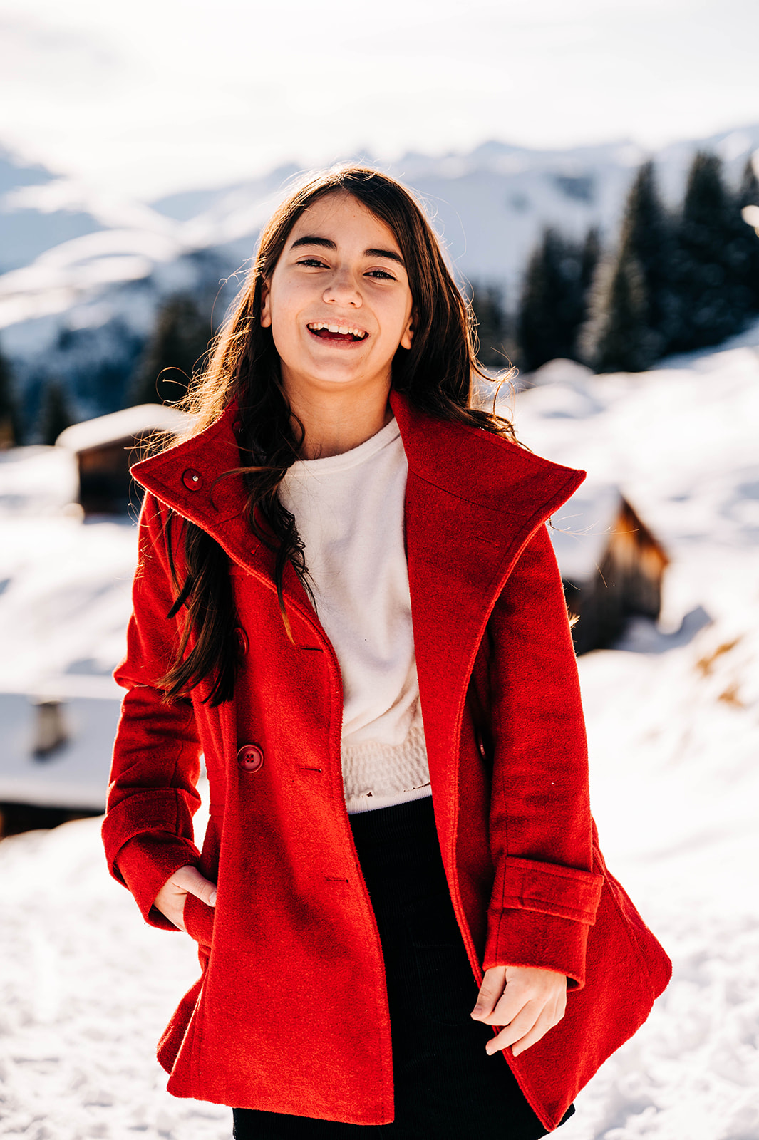 Family Photographer Switzerland Winter Snow Girl in Red Coat Portrait 