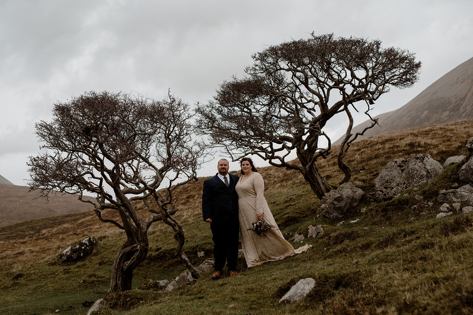 Isle of Skye Elopement Couple between Two Trees