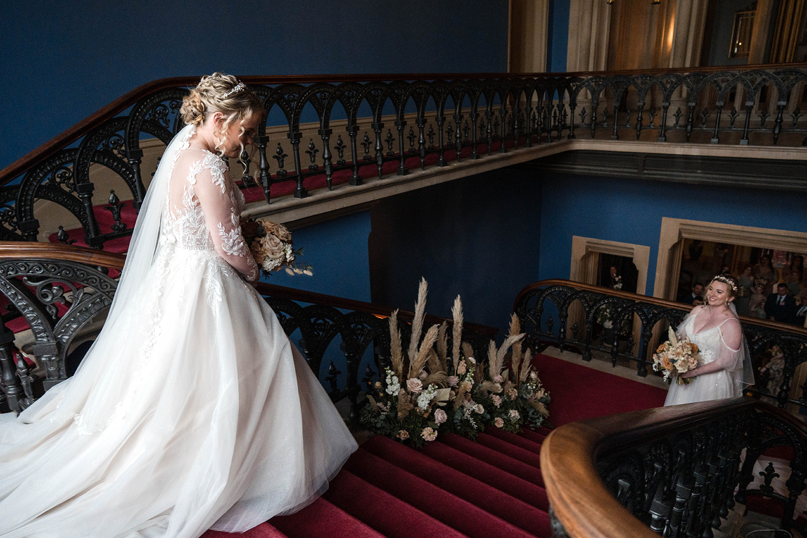 two brides looking at each other for first time Zara Davis Wedding Photography Cotswolds Grittleton House Gloucestershir