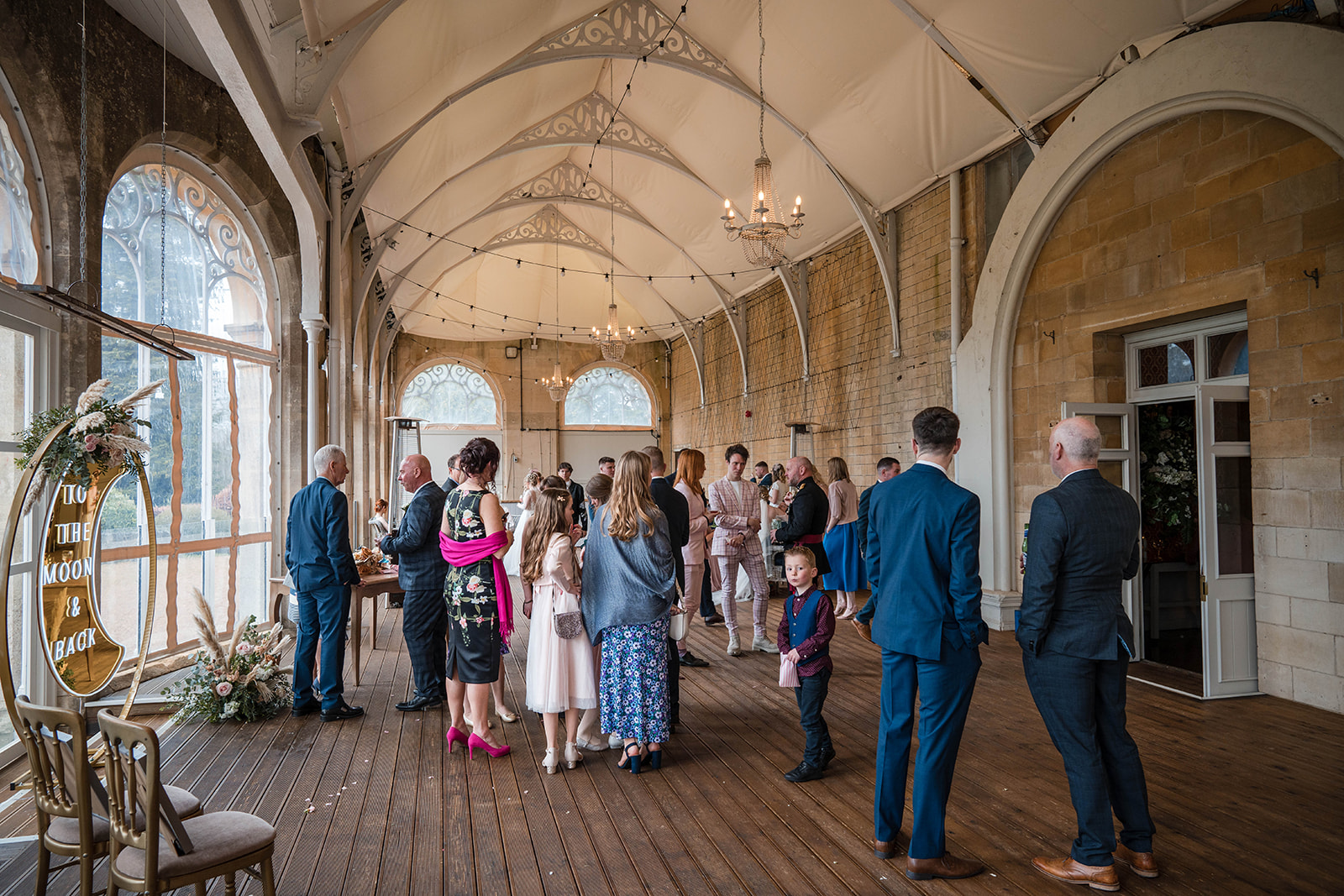 guests mingling during drinks reception Zara Davis Wedding Photography Cotswolds Grittleton House Gloucestershire Wiltsh