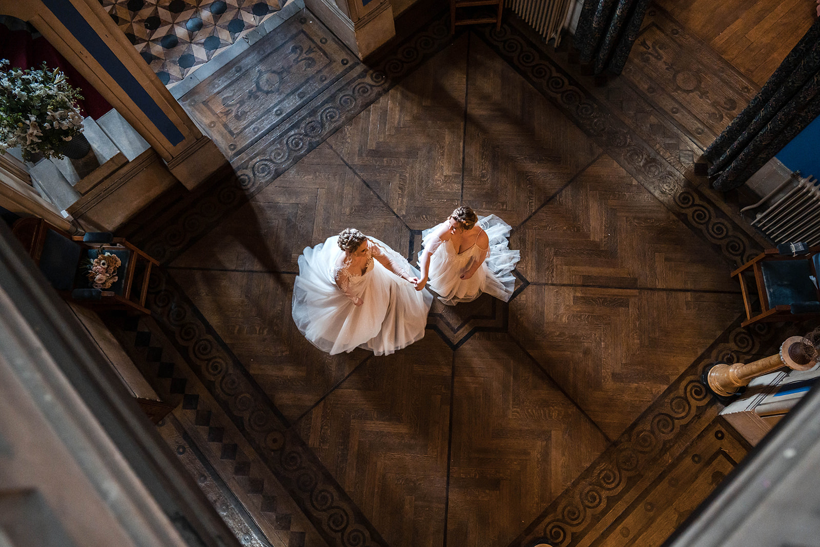 above two brides dancing Zara Davis Wedding Photography Cotswolds Grittleton House Gloucestershire Wiltshire