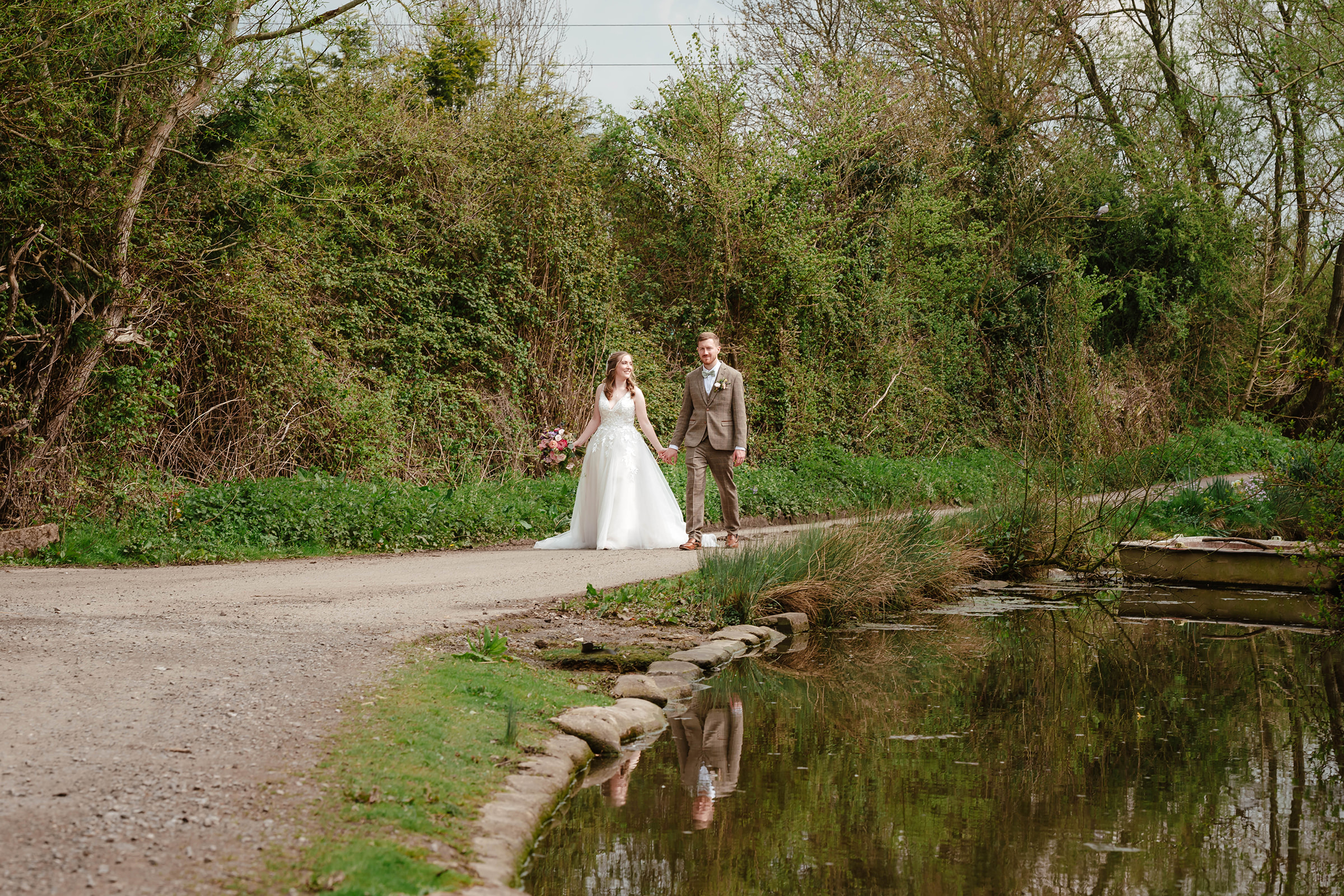 Zara Davis Wedding Photography Milton End Barn Arlingham Gloucestershire Cheltenham Cotswolds Bride and Groom walking