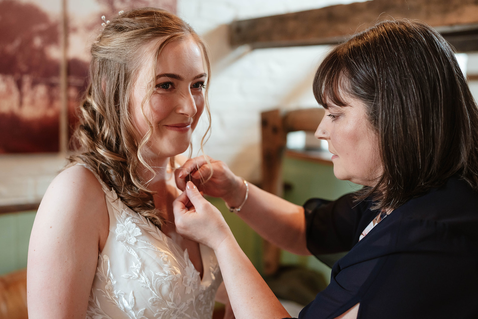 Zara Davis Wedding Photography Milton End Barn Arlingham Gloucestershire Cheltenham Cotswolds mum doing necklace