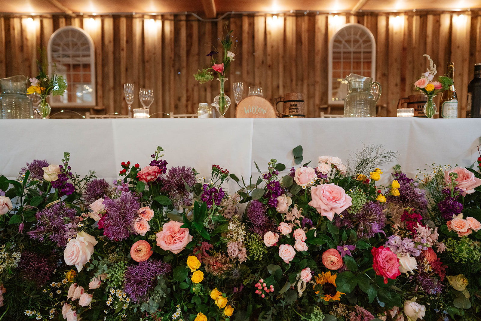 Zara Davis Wedding Photography Milton End Barn Arlingham Gloucestershire Cheltenham Cotswolds table flowers top