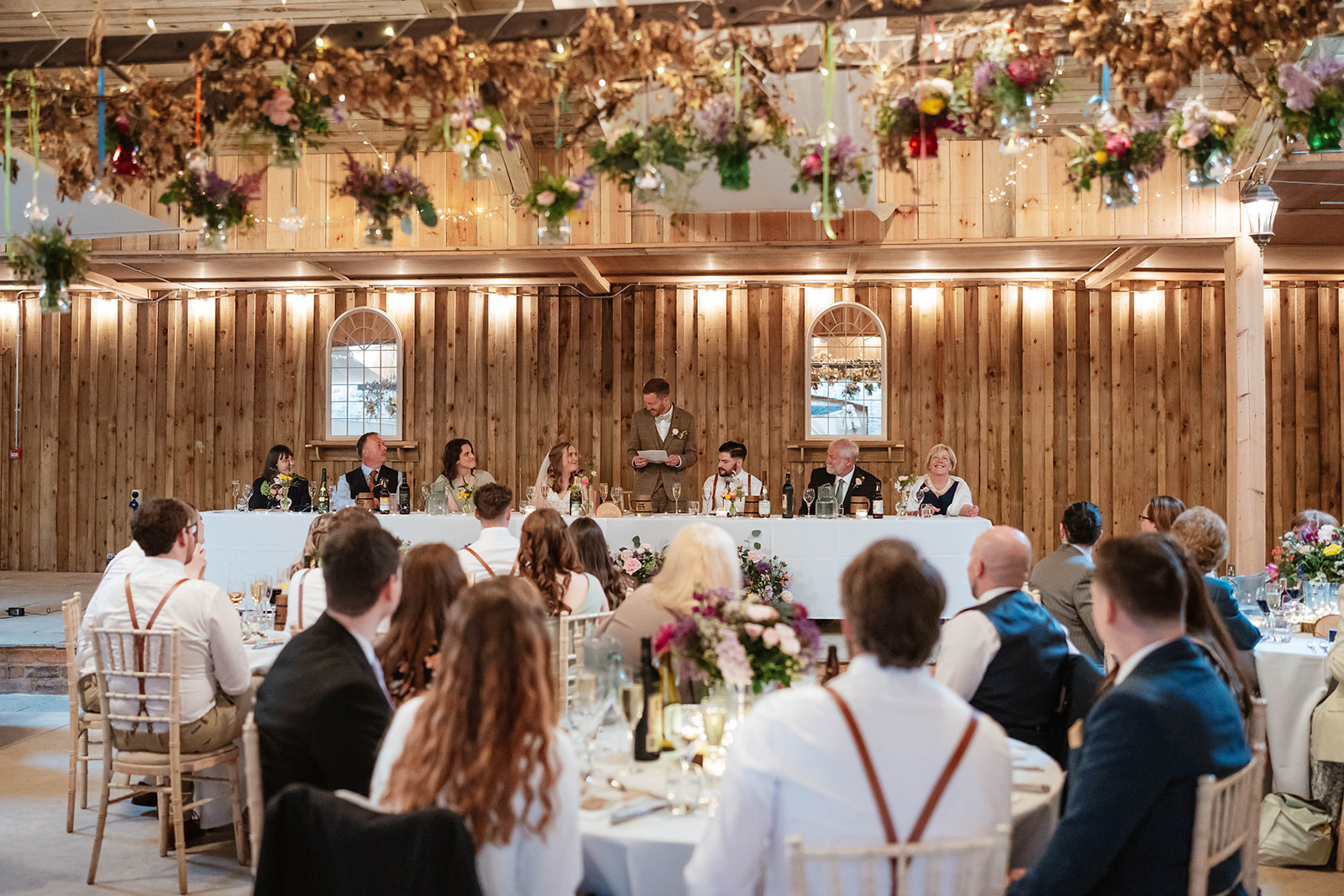 Zara Davis Wedding Photography Milton End Barn Arlingham Gloucestershire Cheltenham Cotswolds cheers to newlyweds
