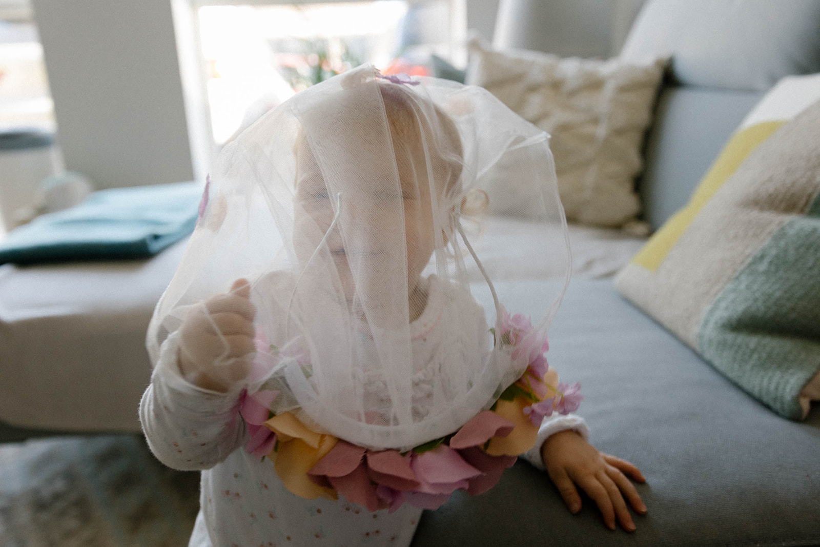 child with wedding veil