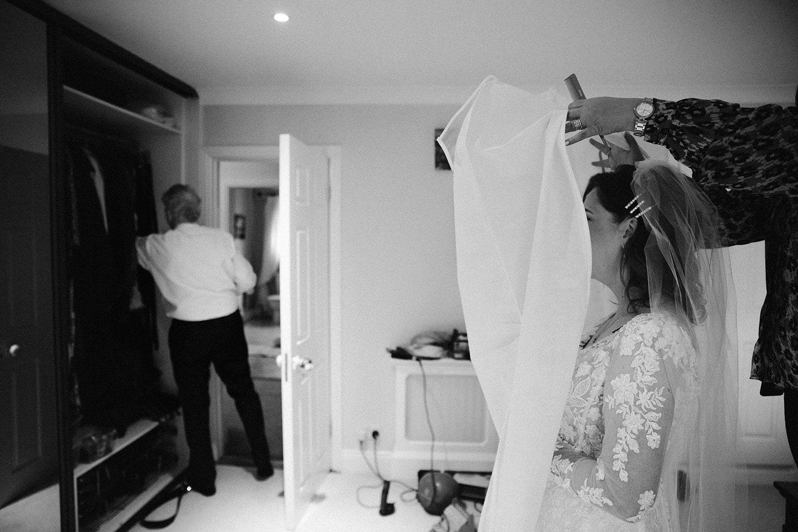 bride hides from dad in her dress