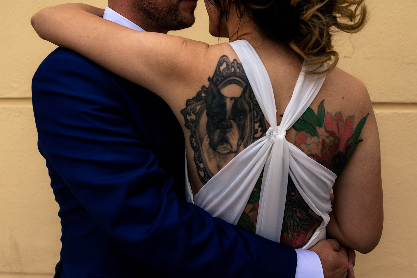 bride with back tattoo