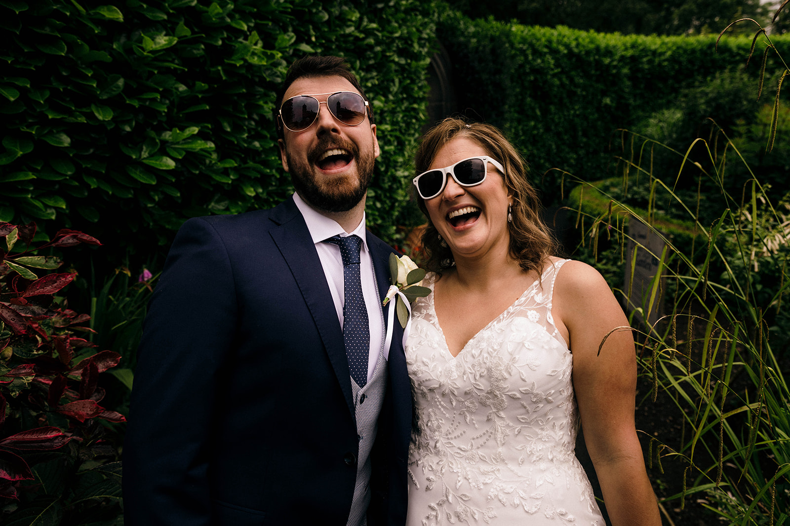 fun couple wi wedding sunglasses 
