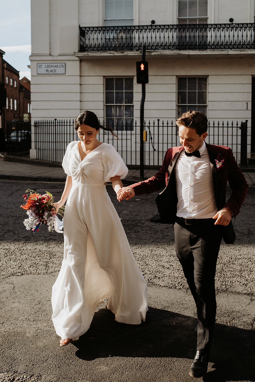 Couple cross the streets of York for their winter elopement 