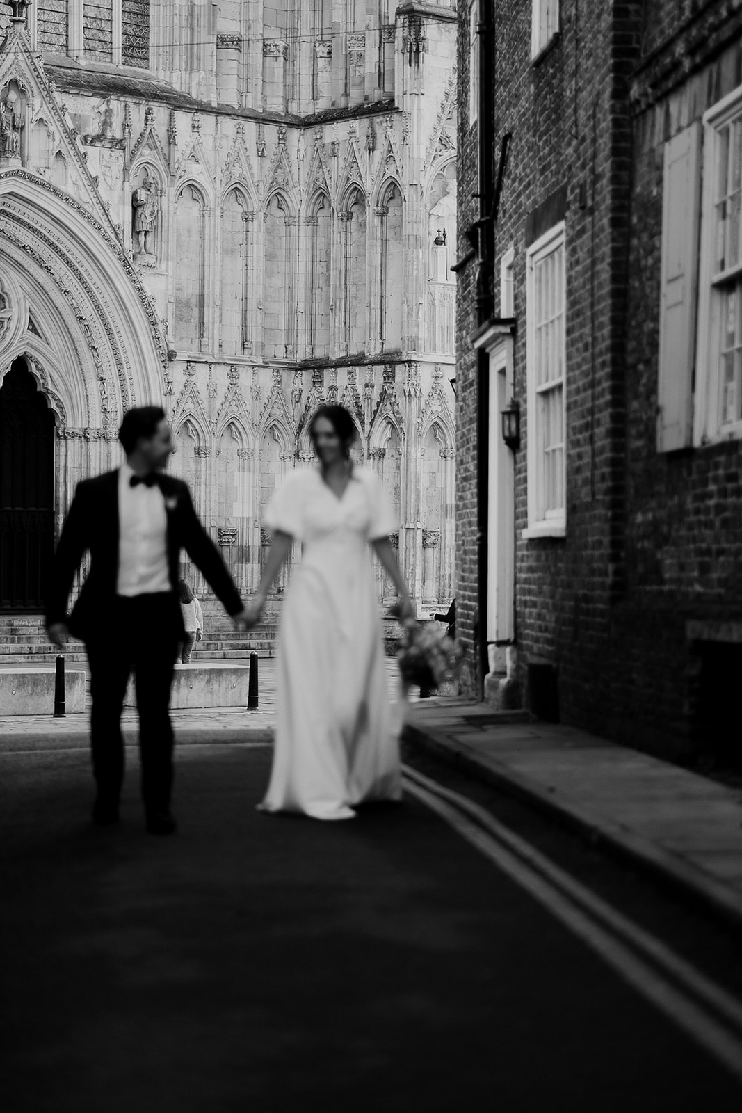 Black & White Image of a Couple outside of York Minster for their Winter City Elopement 
