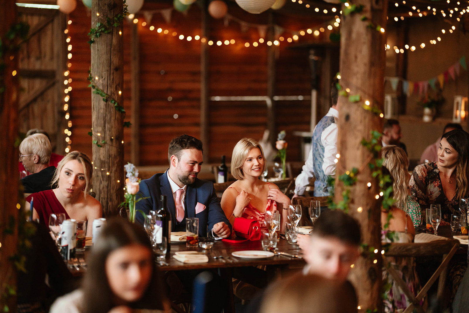 Zara Davis Wedding Photography Moor Farm Moreton Valance Gloucestershire Cotswolds guests surrounded by fairy lights