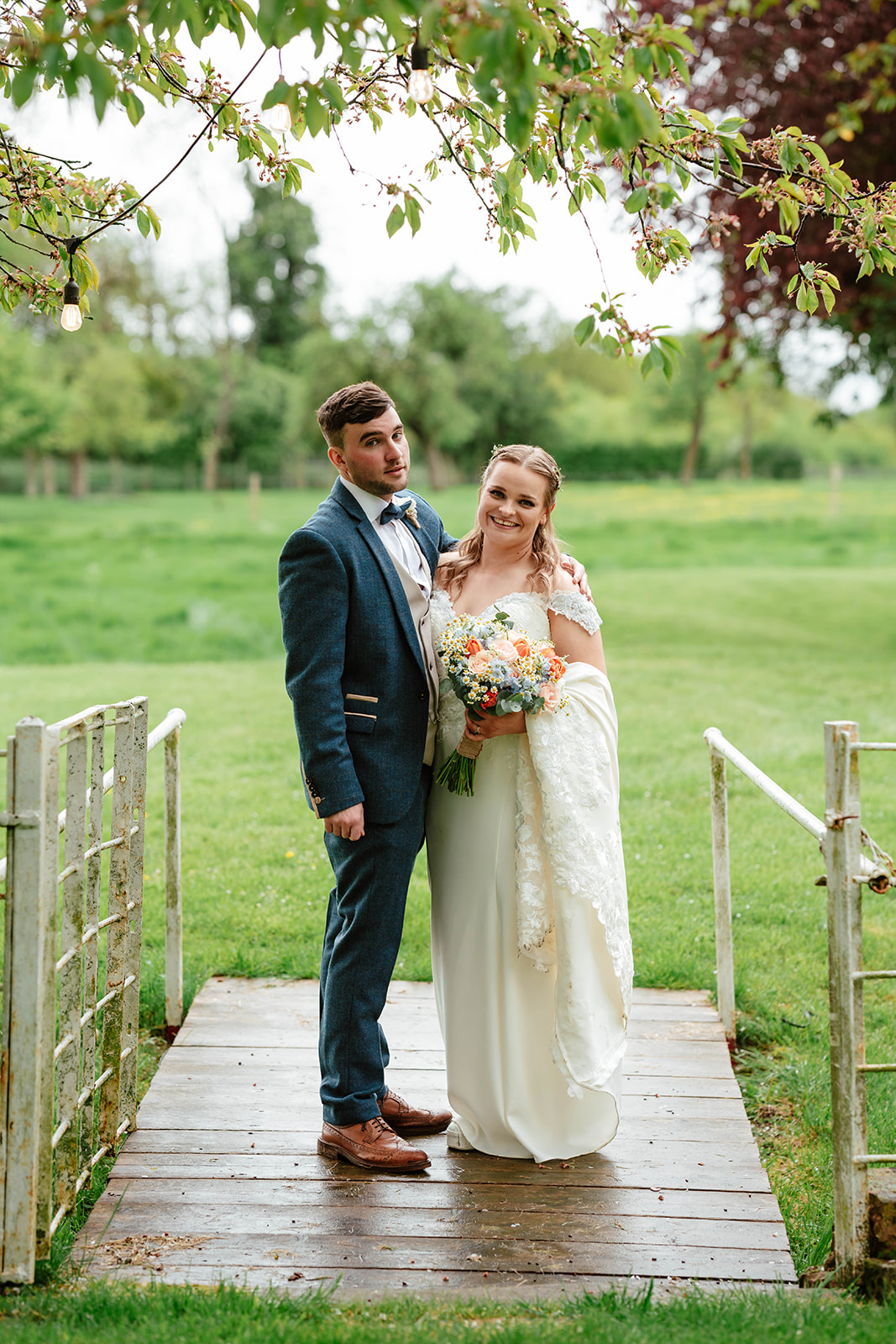 Zara Davis Wedding Photography Moor Farm Moreton Valance Gloucestershire Cotswolds bride groom on the bridge