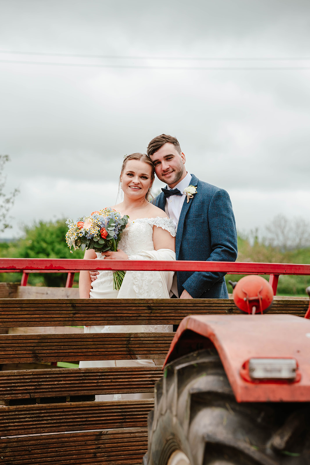 Zara Davis Wedding Photography Moor Farm Moreton Valance Gloucestershire Cotswolds bride groom on tractor