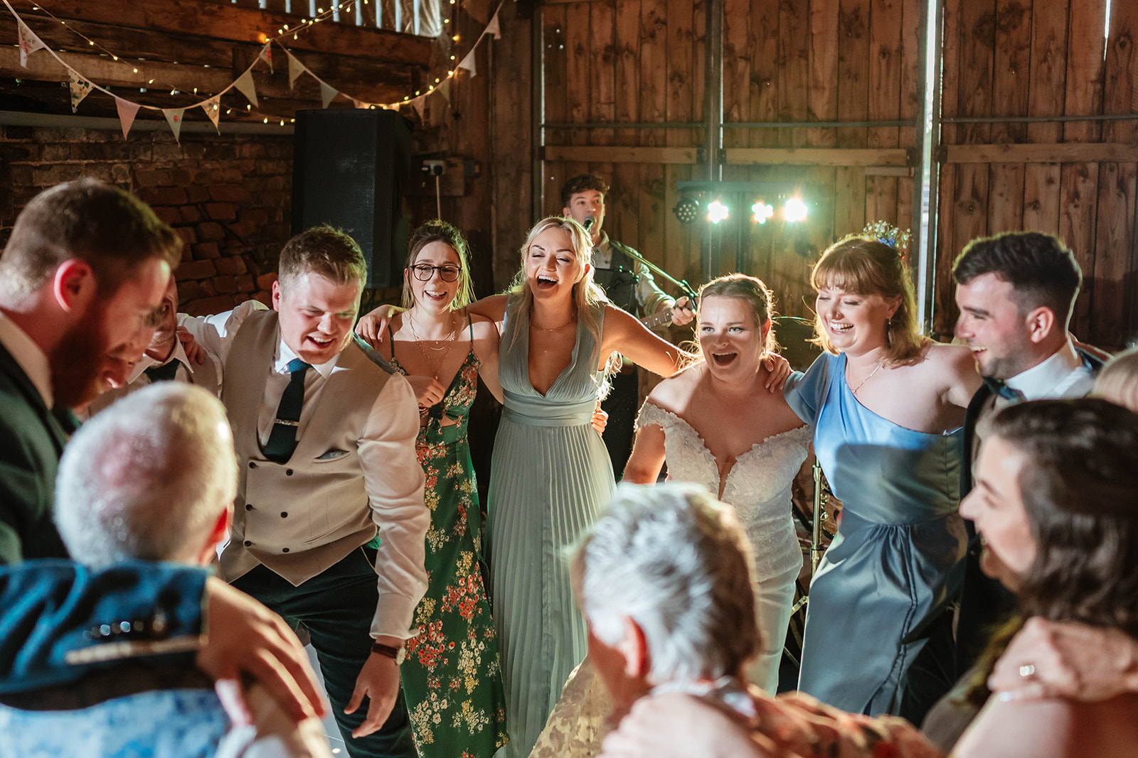Zara Davis Wedding Photography Moor Farm Moreton Valance Gloucestershire Cotswolds guests dancing laughing