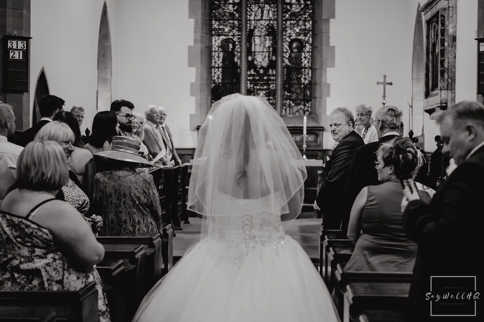 Documentary Wedding Photography Portfolio - Andy Saywell - groom watching as his bride walks down the aisle
