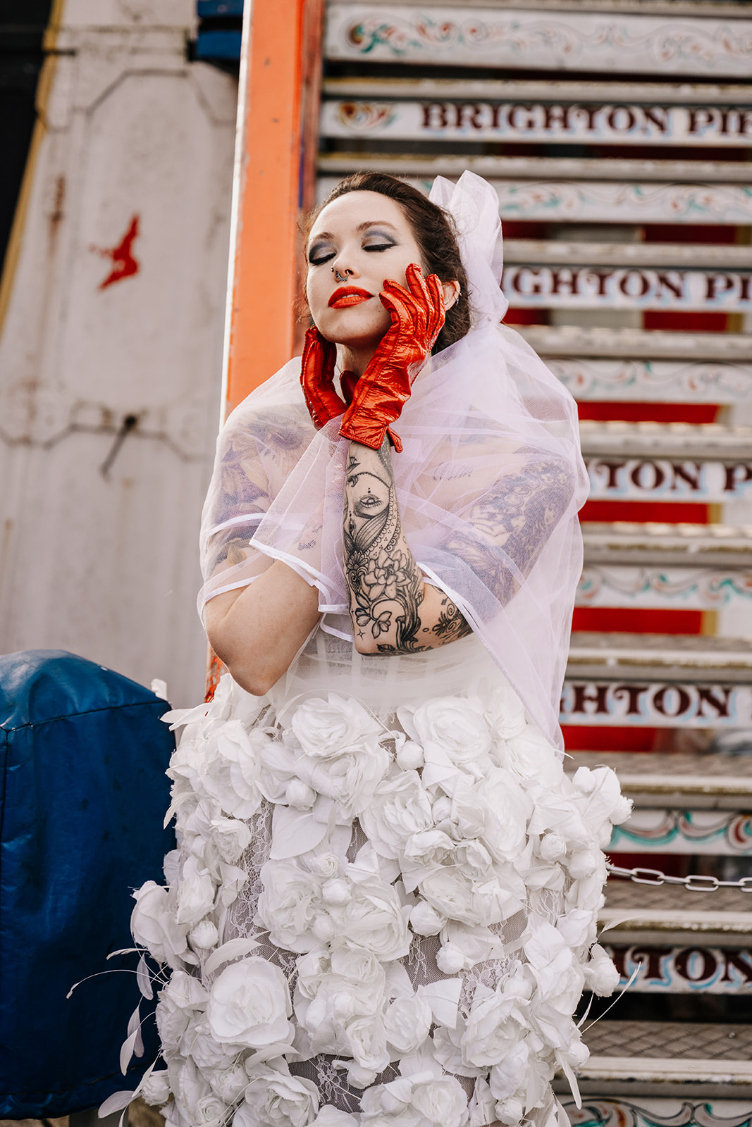 A tattoed bride in a wedding dress