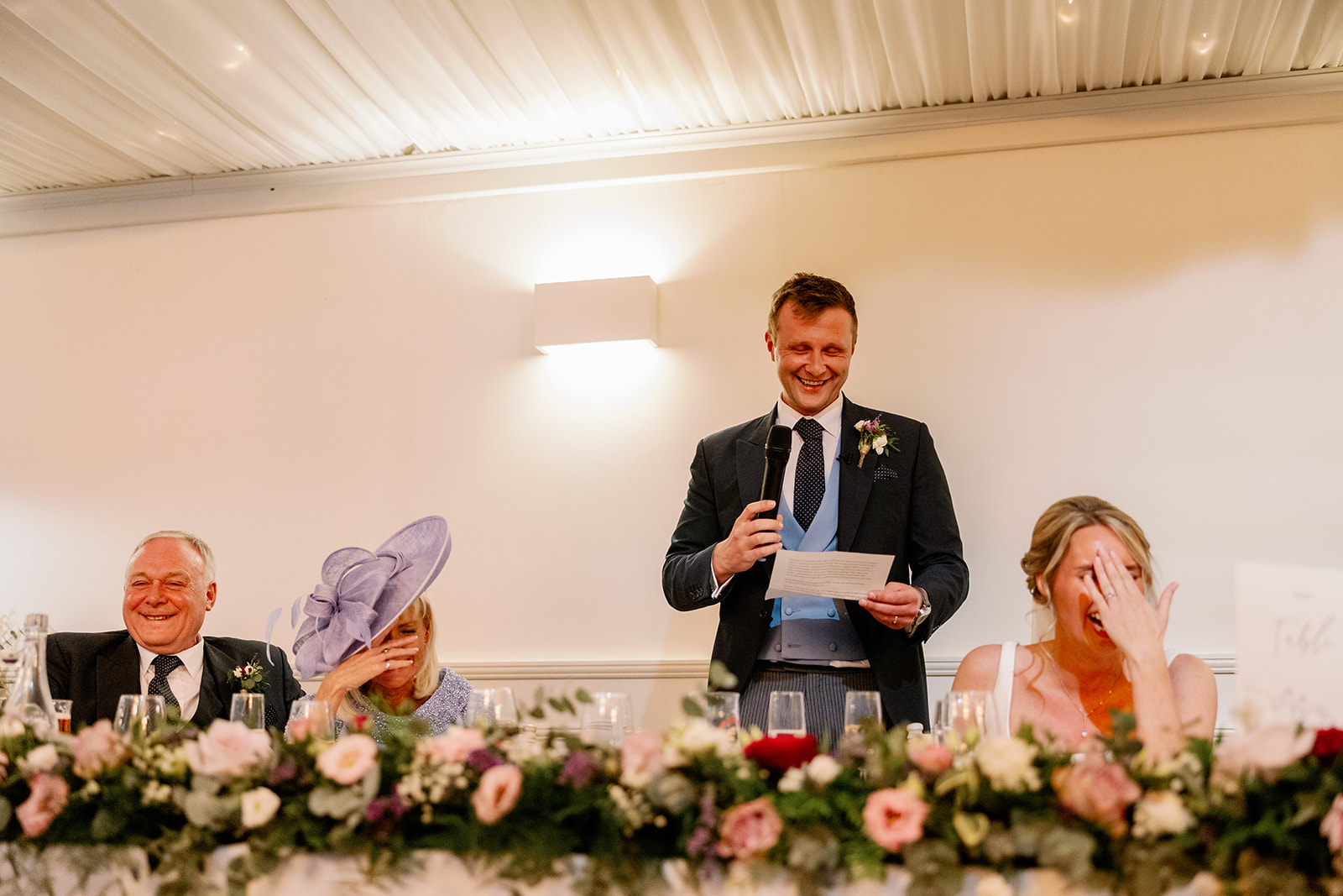 groom reading out his wedding speech at iscoyd park