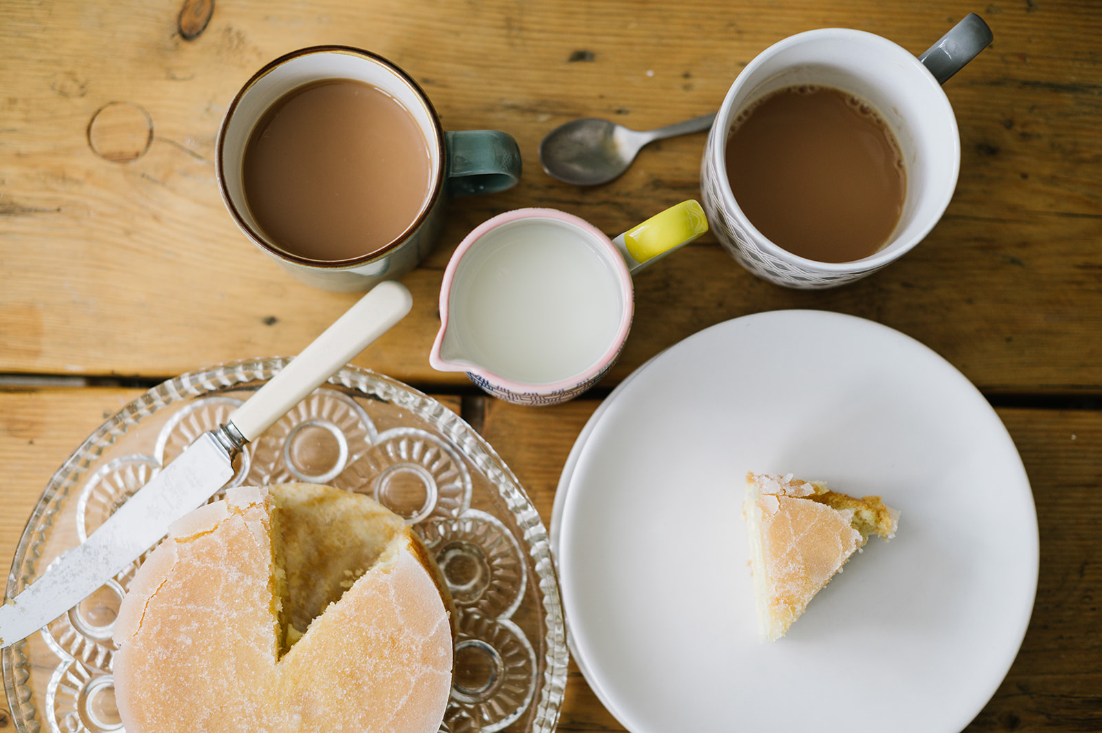 details of tea and cake on a wooden table for business photos