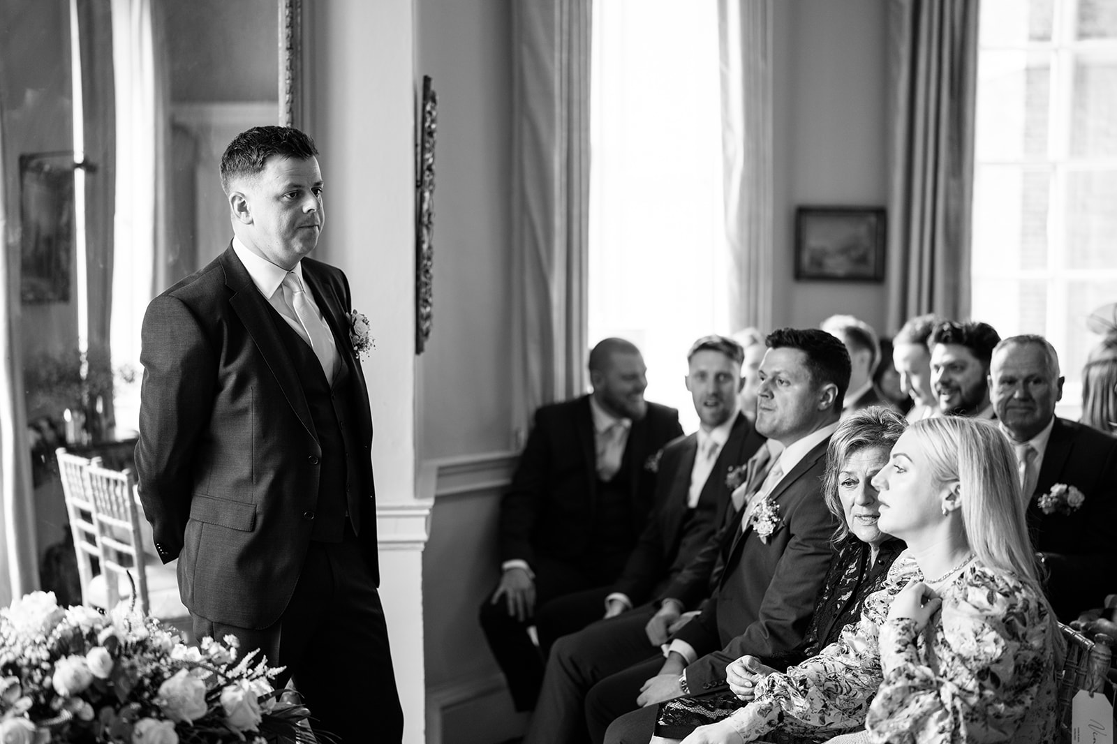The groom looking nervous in the ceremony room at Norwood Park
