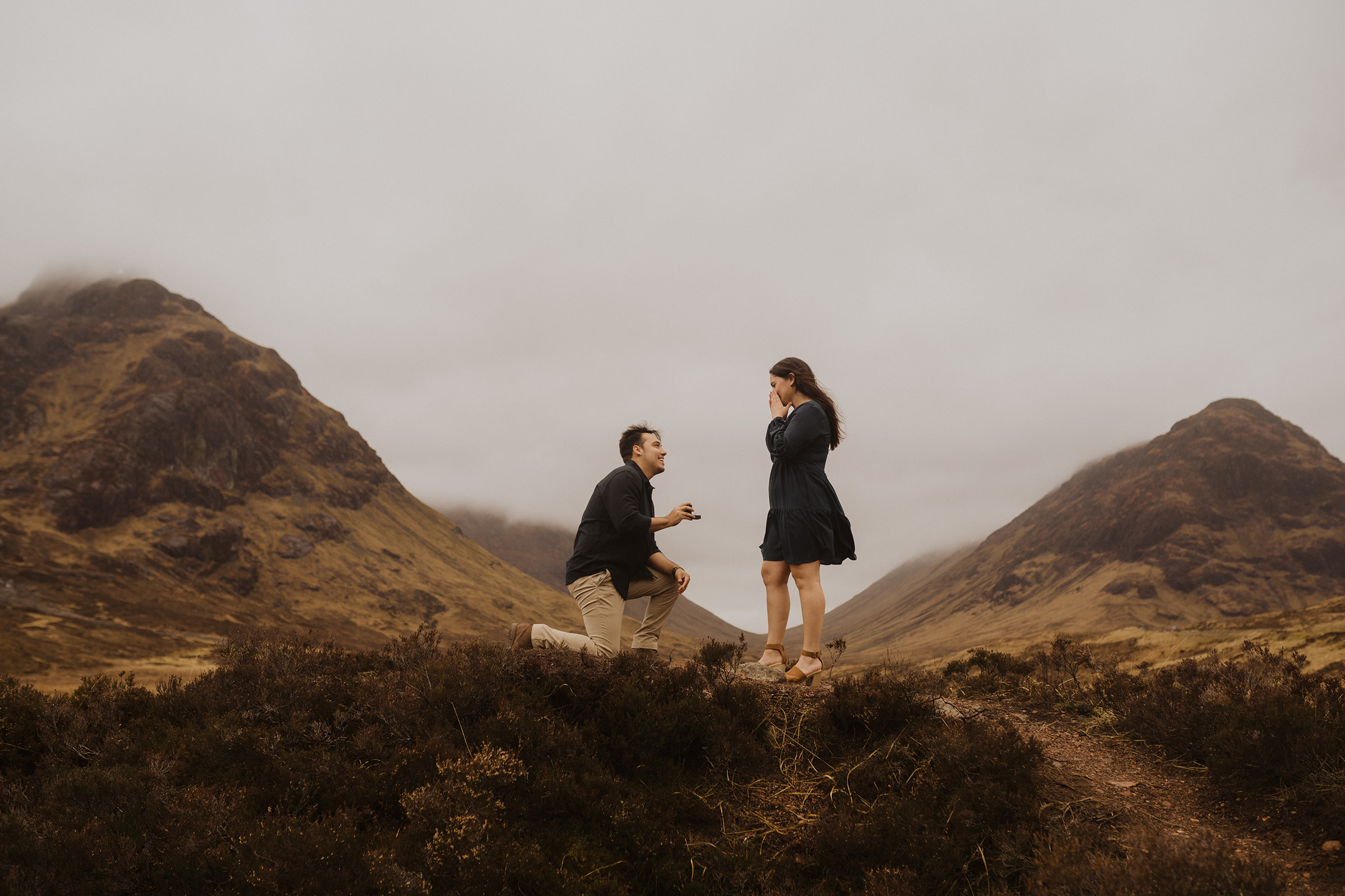 A couple have a proposal in the Glencoe valley, Scotland