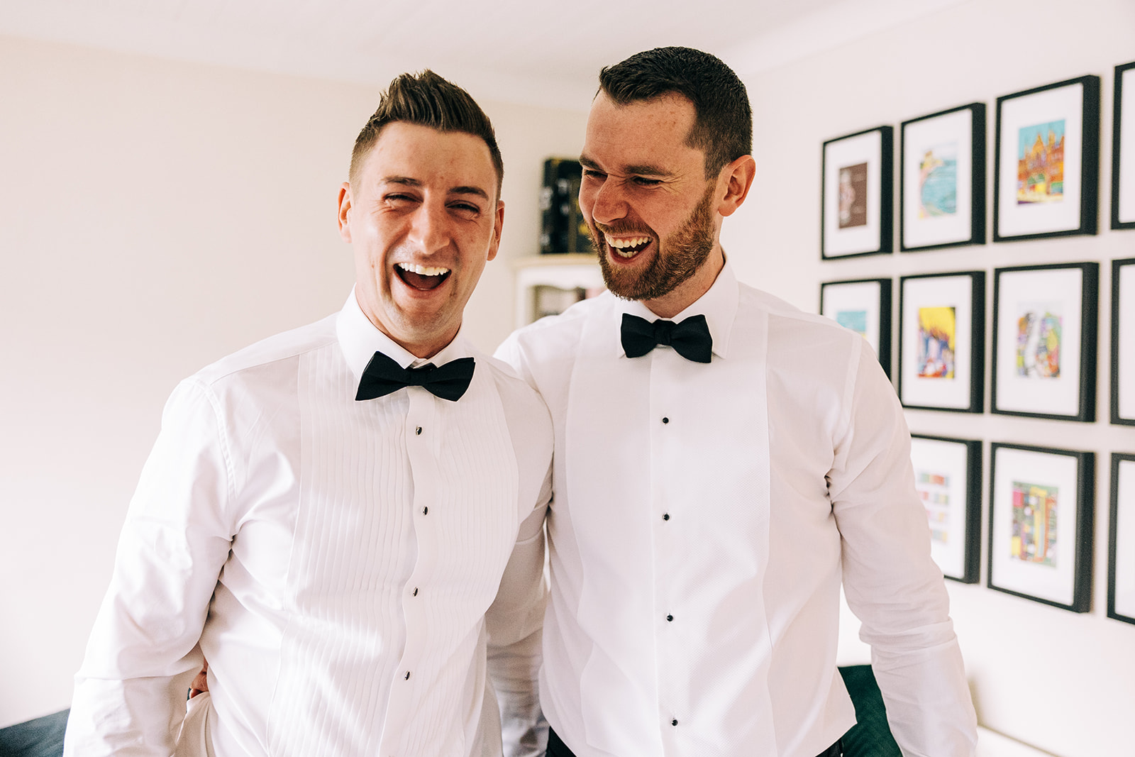 A groom and his best man sharing a joke before the ceremony starts