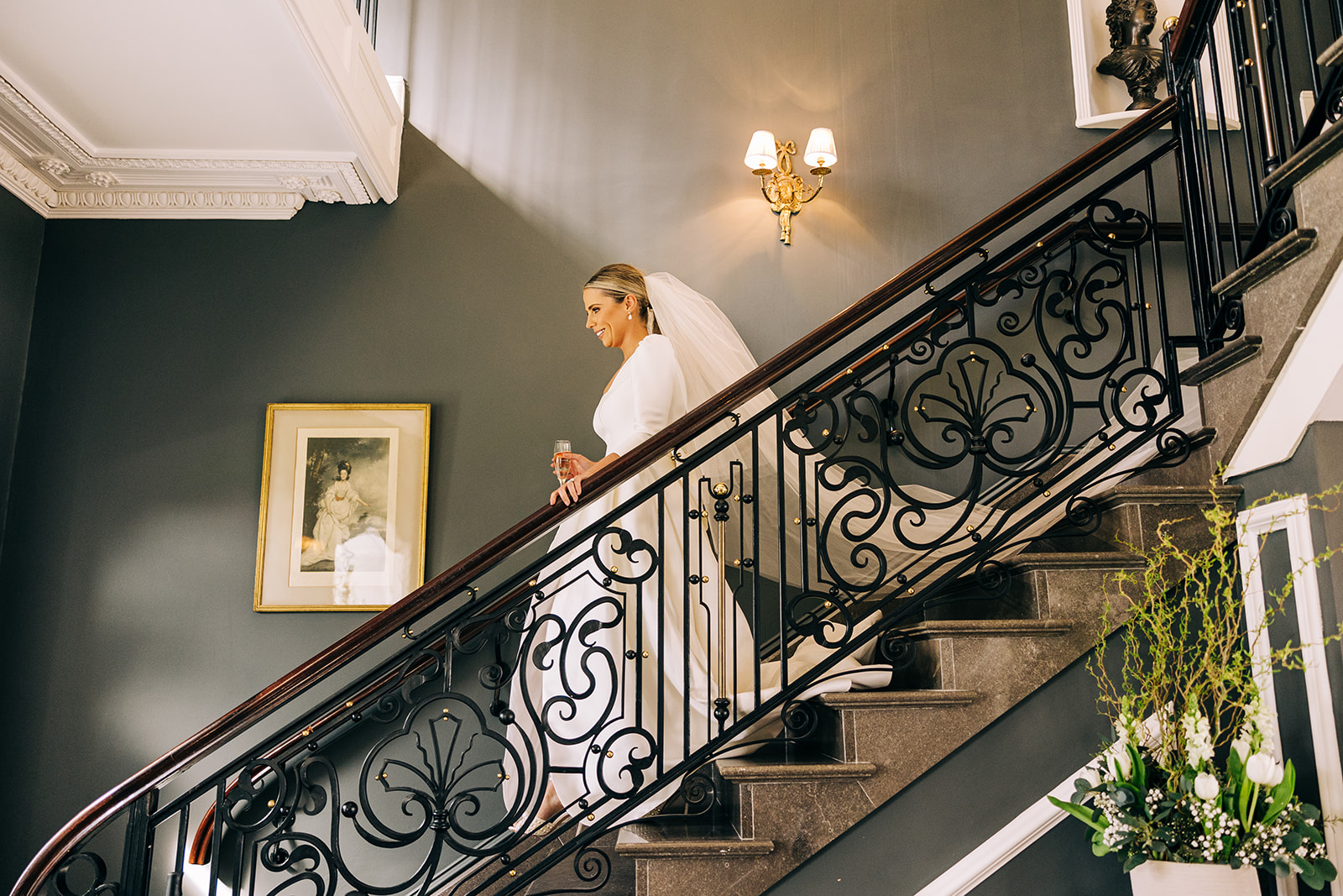 Katie walking down the stairs at Clonabreany House