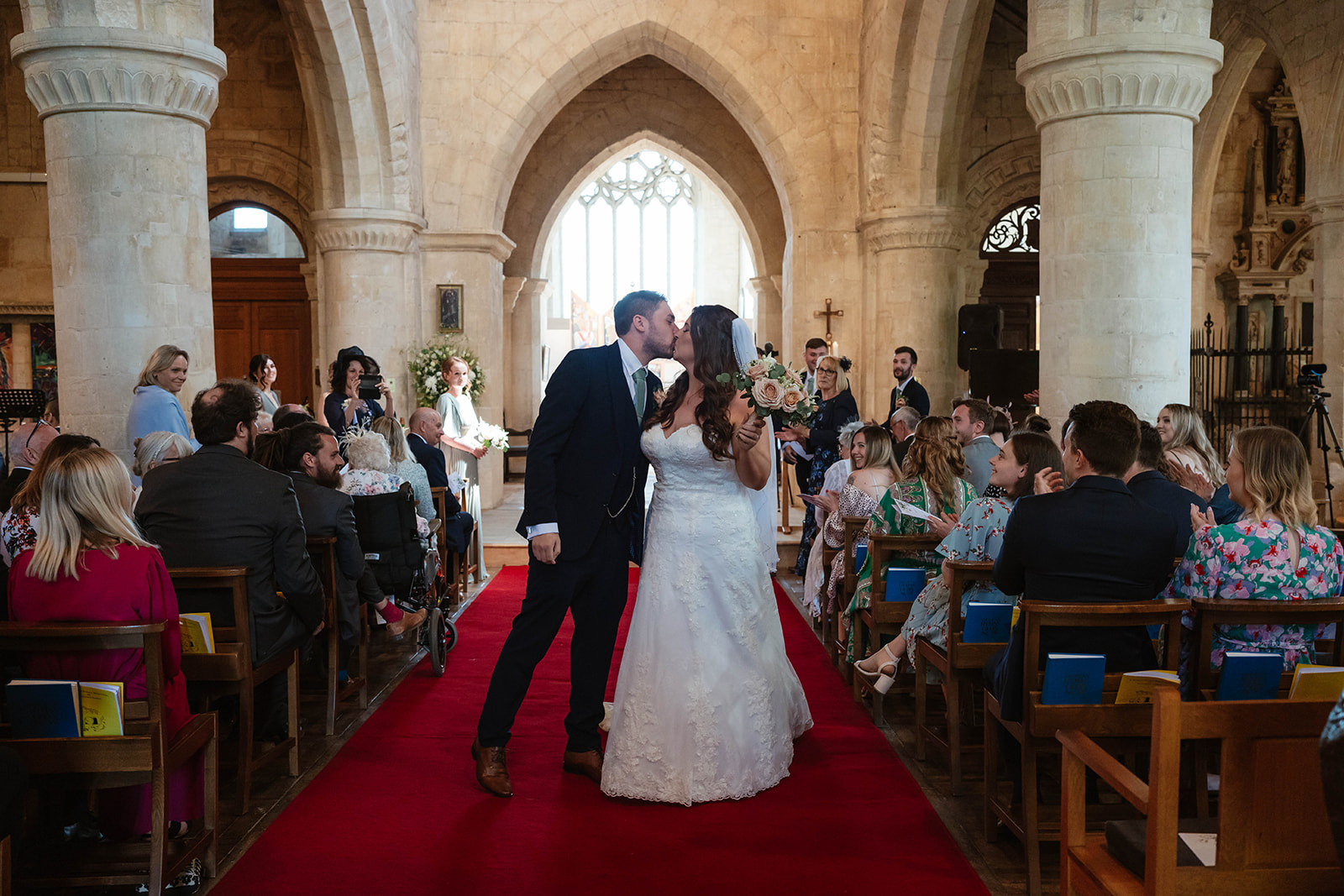 Dumbleton Hall Zara Davis Wedding Photography Worcestershire Gloucestershire Cotswolds kiss walking down aisle