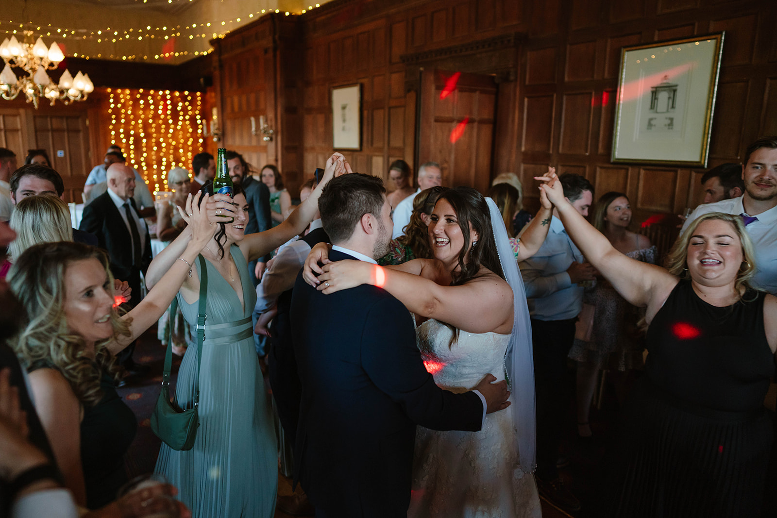 Dumbleton Hall Zara Davis Wedding Photography Worcestershire Gloucestershire Cotswolds bride groom and guests dancing