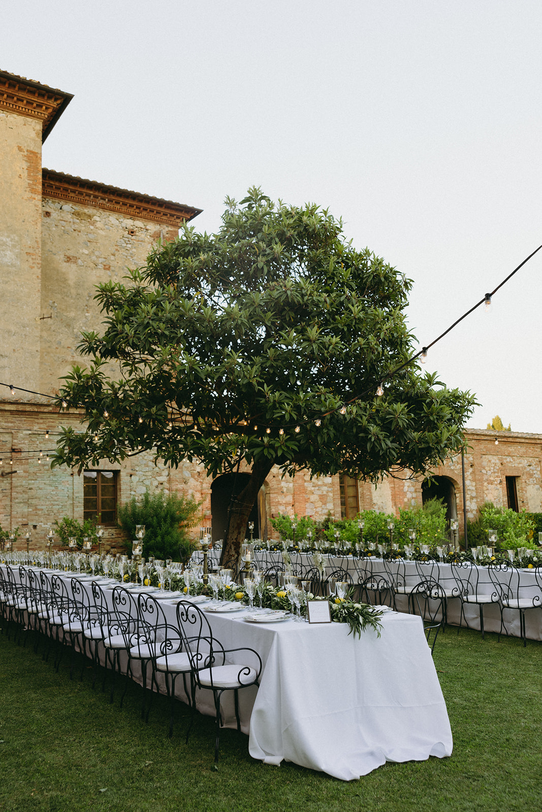 Stunning table setting at a destination wedding in Pienza