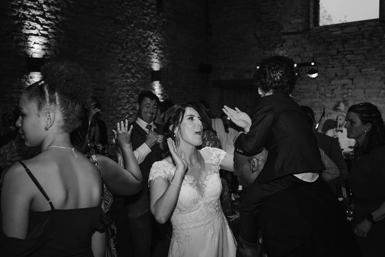 black and white of everyone on dance floor