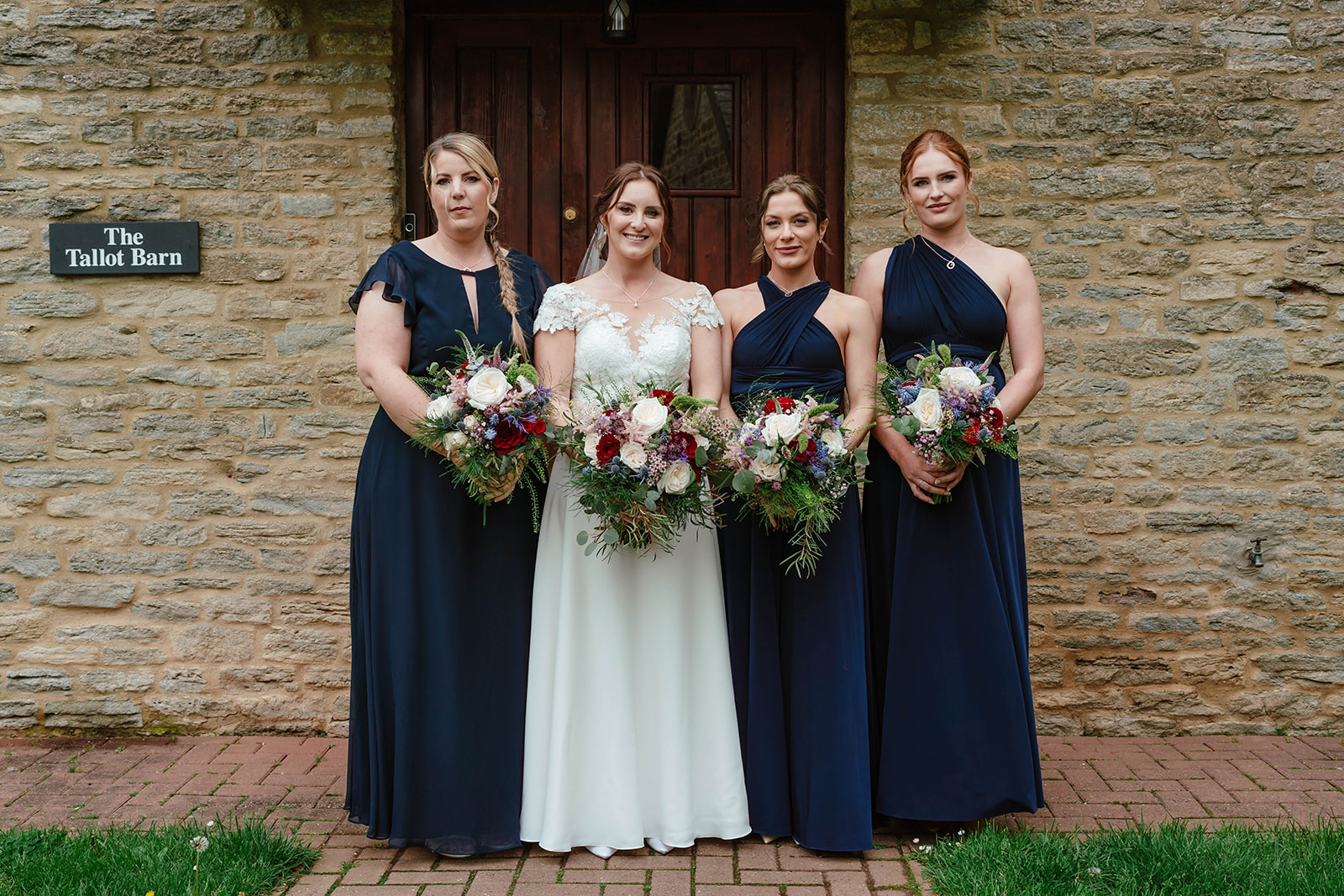 Bridal party portrait in front of house