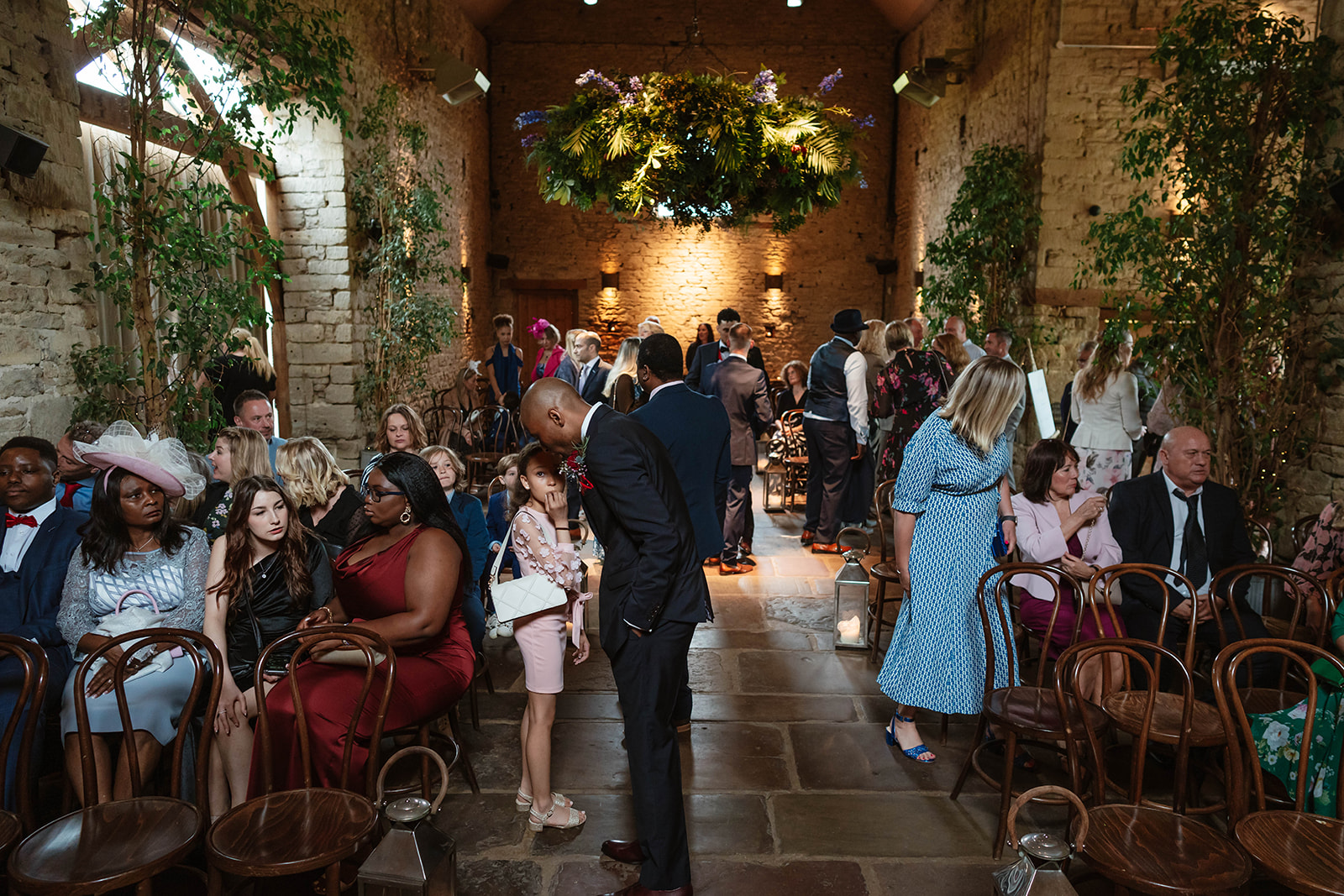 Guests taking their seats for the ceremony at Cripps Barn Cotswolds