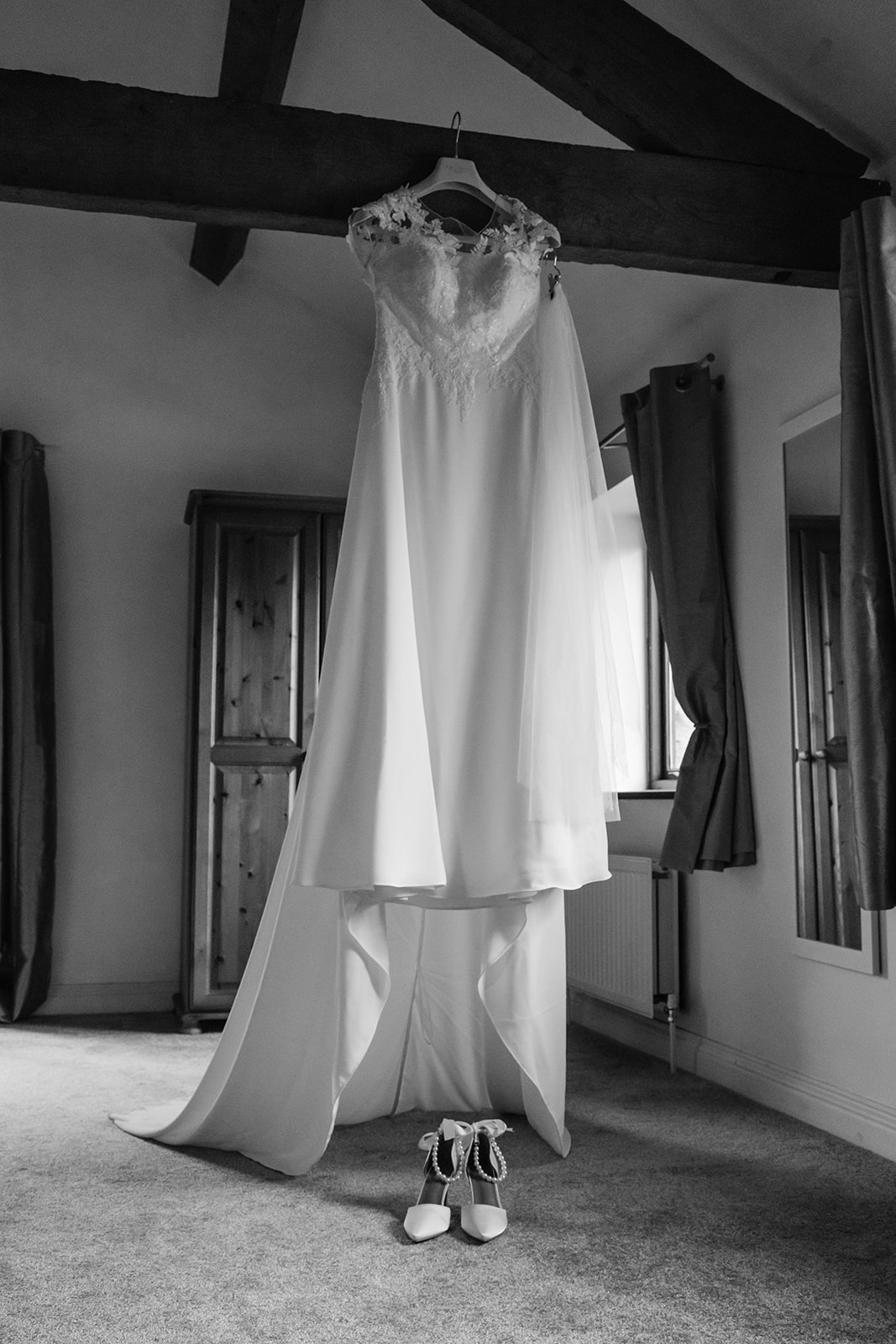 Hanging Wedding Dress in Black and White at Air bnb Cirencester Cotswolds 