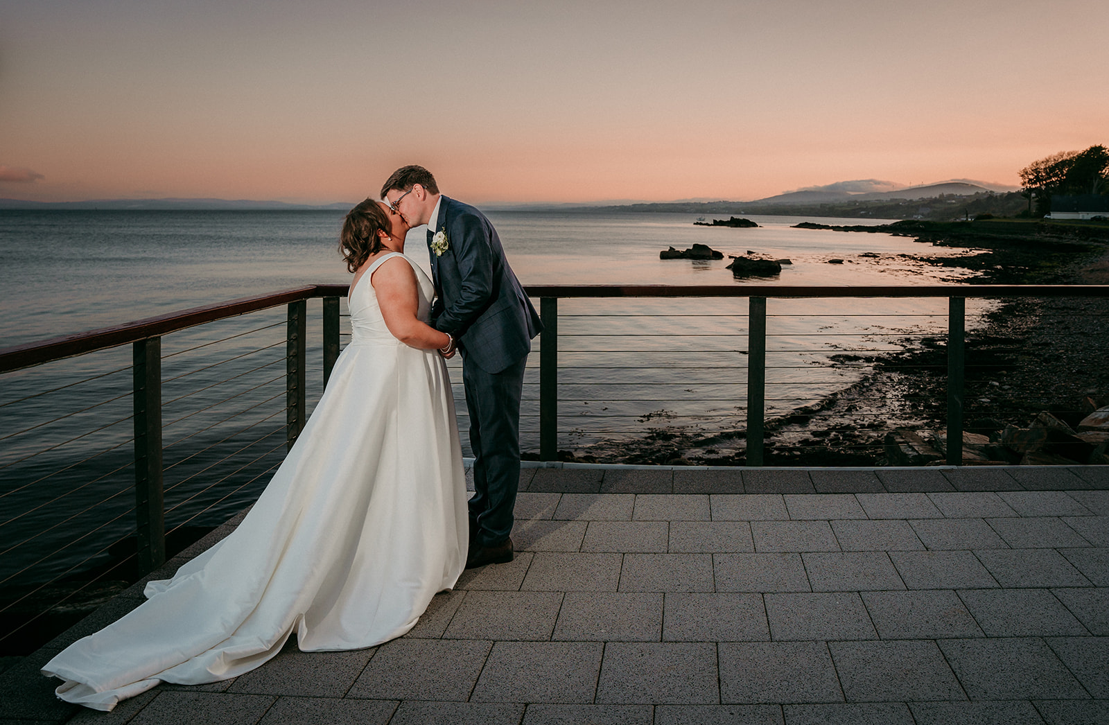 Overlooking the Foyle riverfront at the redcastle hotel in Donegal, Ireland for their dream wedding 