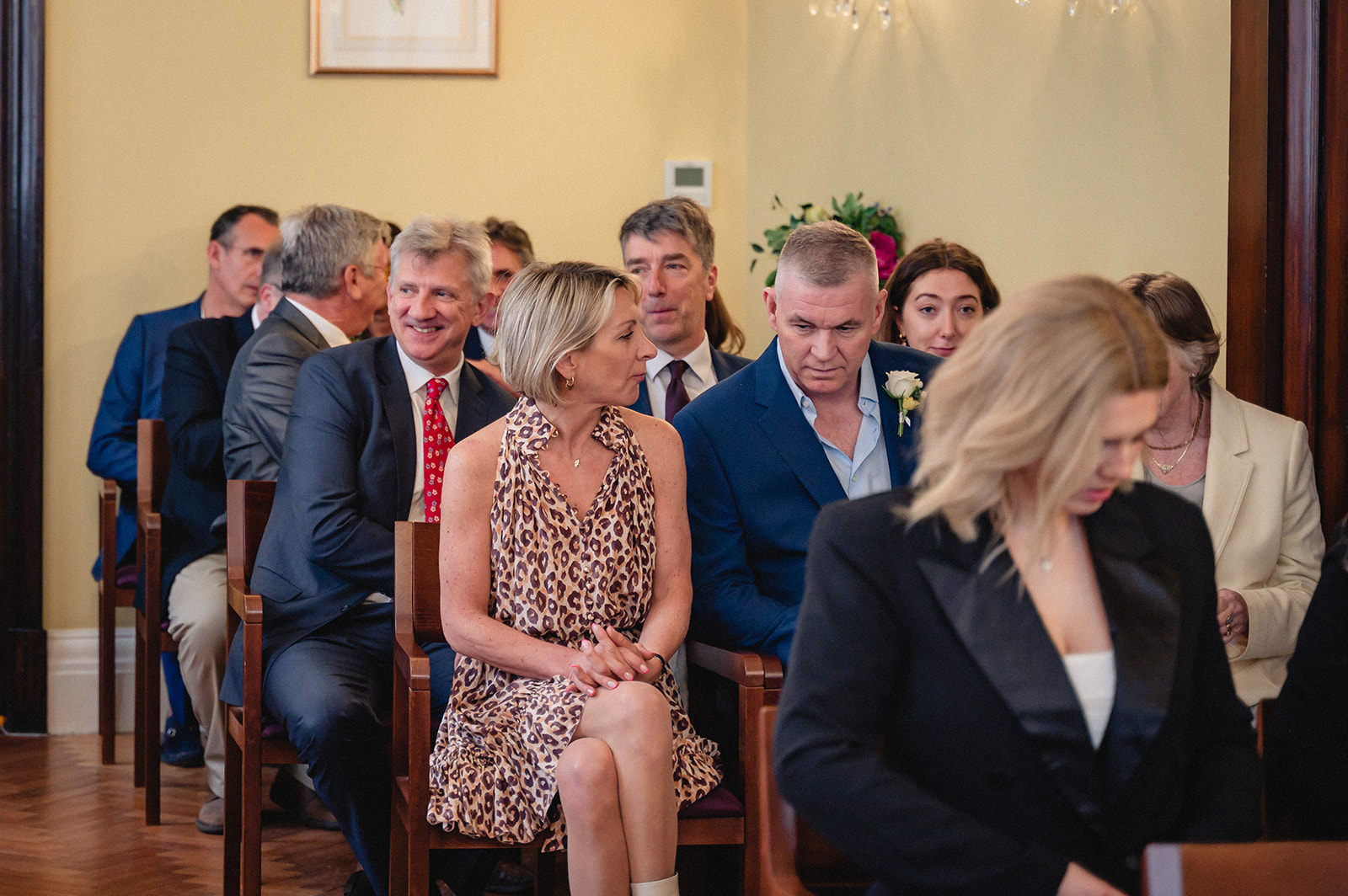Guests waiting for the wedding ceremony in the Brydon Room at Chelsea Town Hall