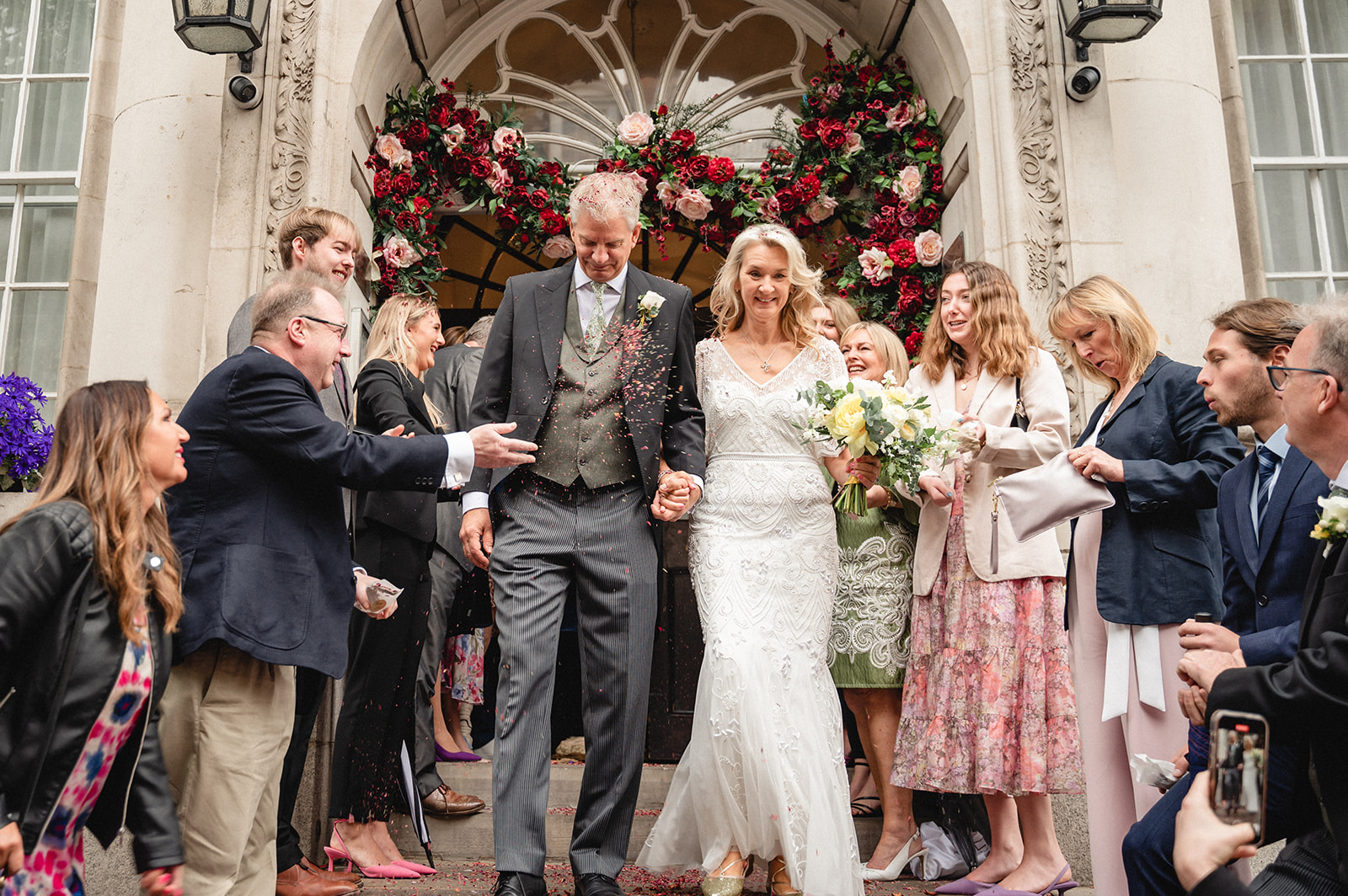 Lindsay and David's welcomed with confetti toss at Chelsea Town Hall
