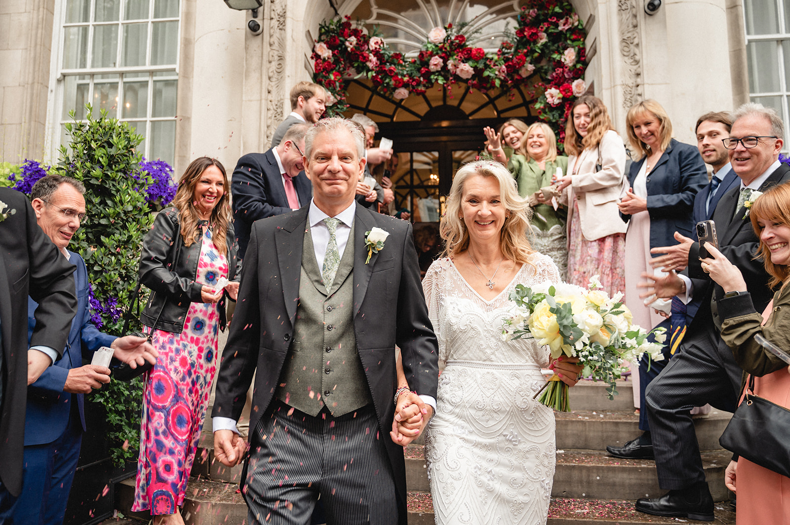 Lindsay and David's welcomed with confetti toss at Chelsea Town Hall