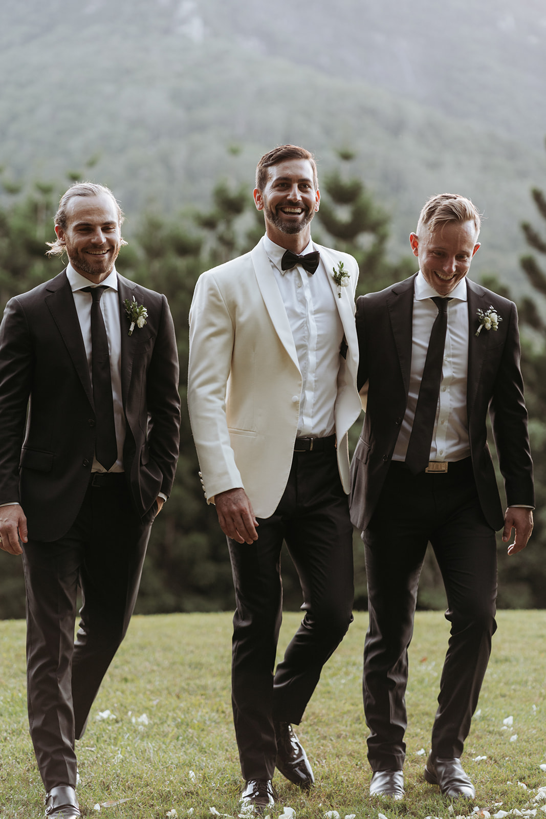 groomsmen in black tie wear 