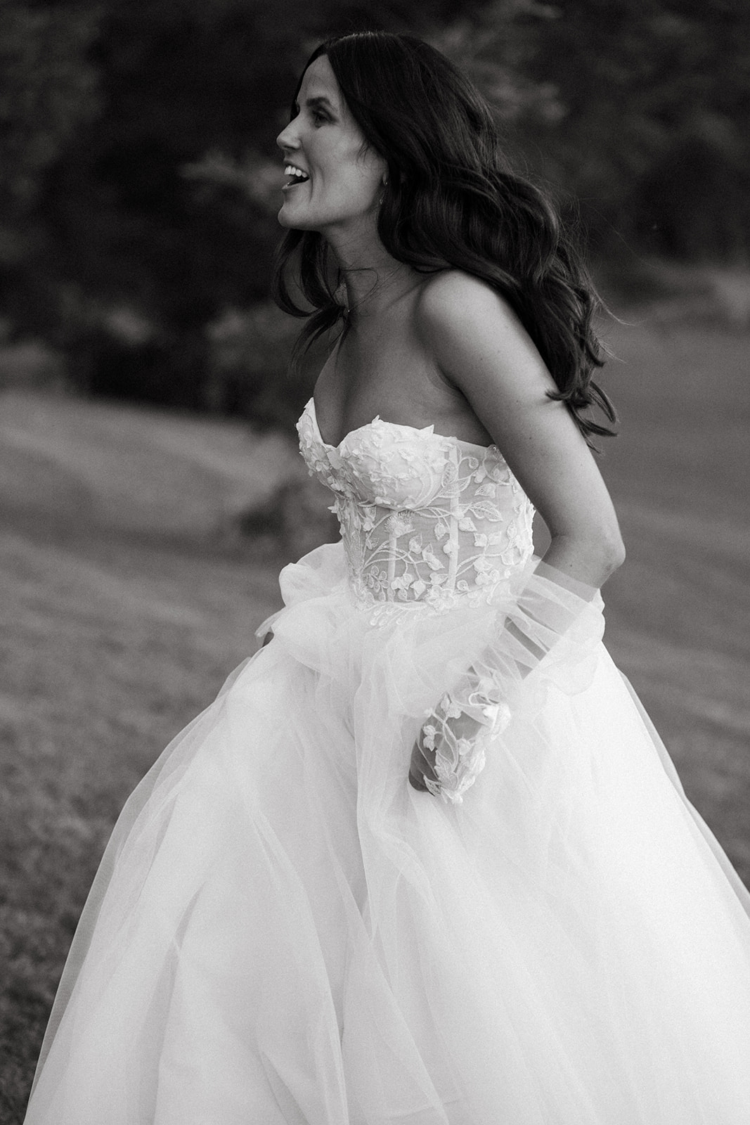 bride running in black and white