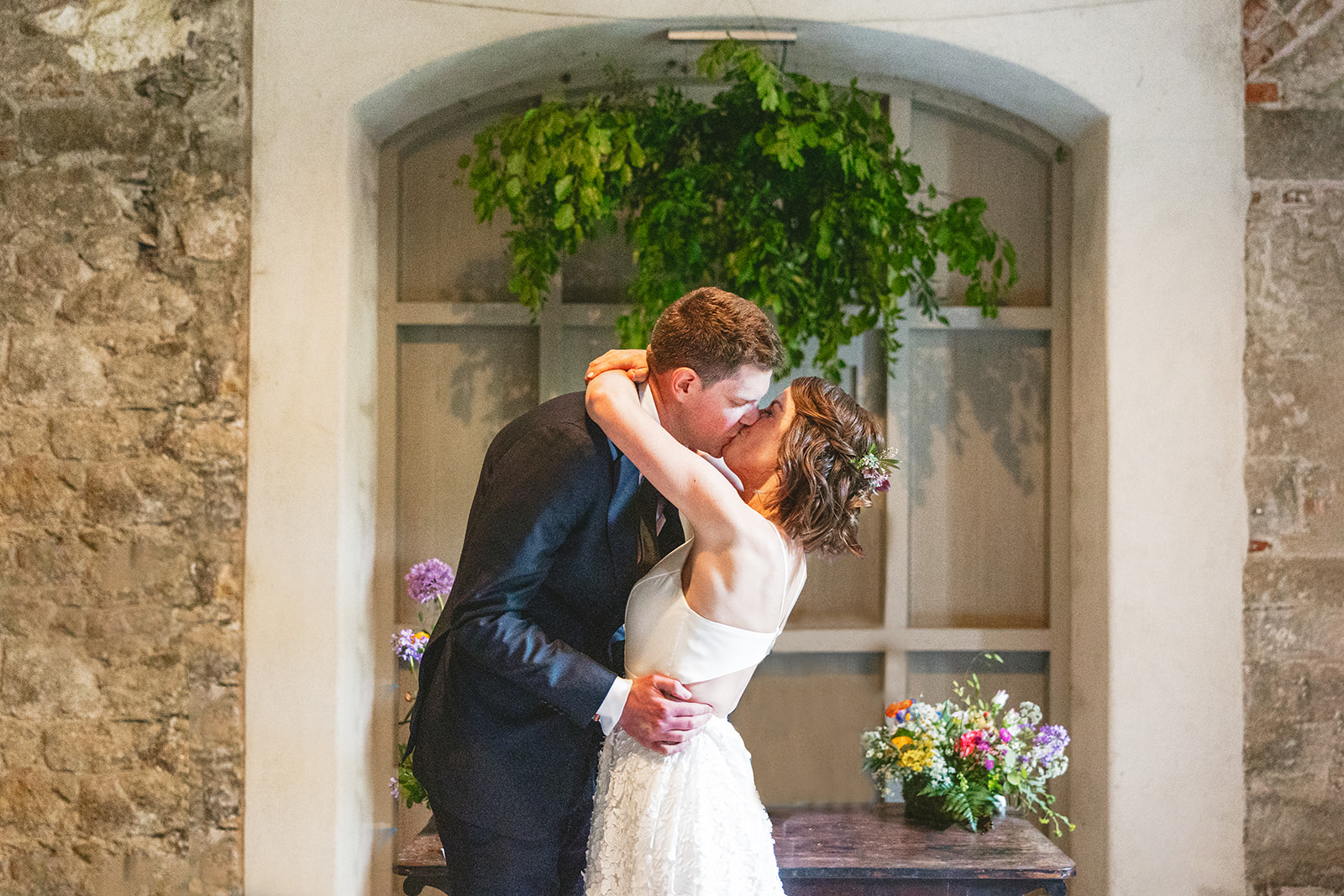 A couple shares a first kiss at their Borris House Wedding Ceremony