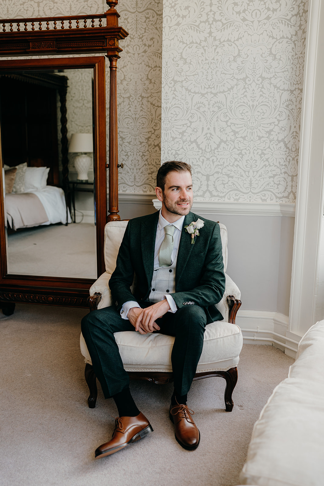 Grooms portrait in the Viscount Suite at Norwood Park