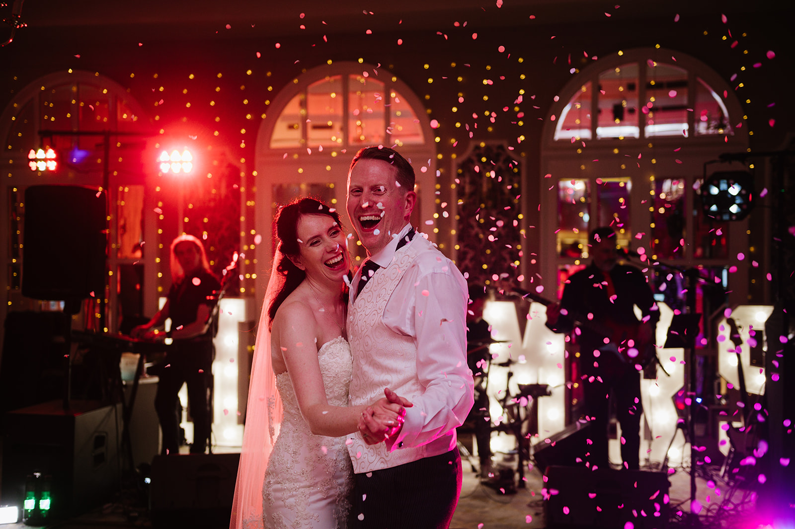 bride and groom showered with confetti during their first dance at moor hall hotel in sutton coldfield