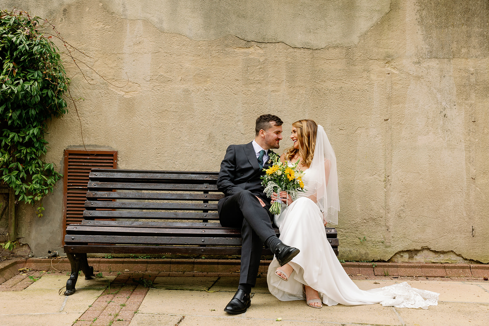 A wedding couple laughing in Harrogate 