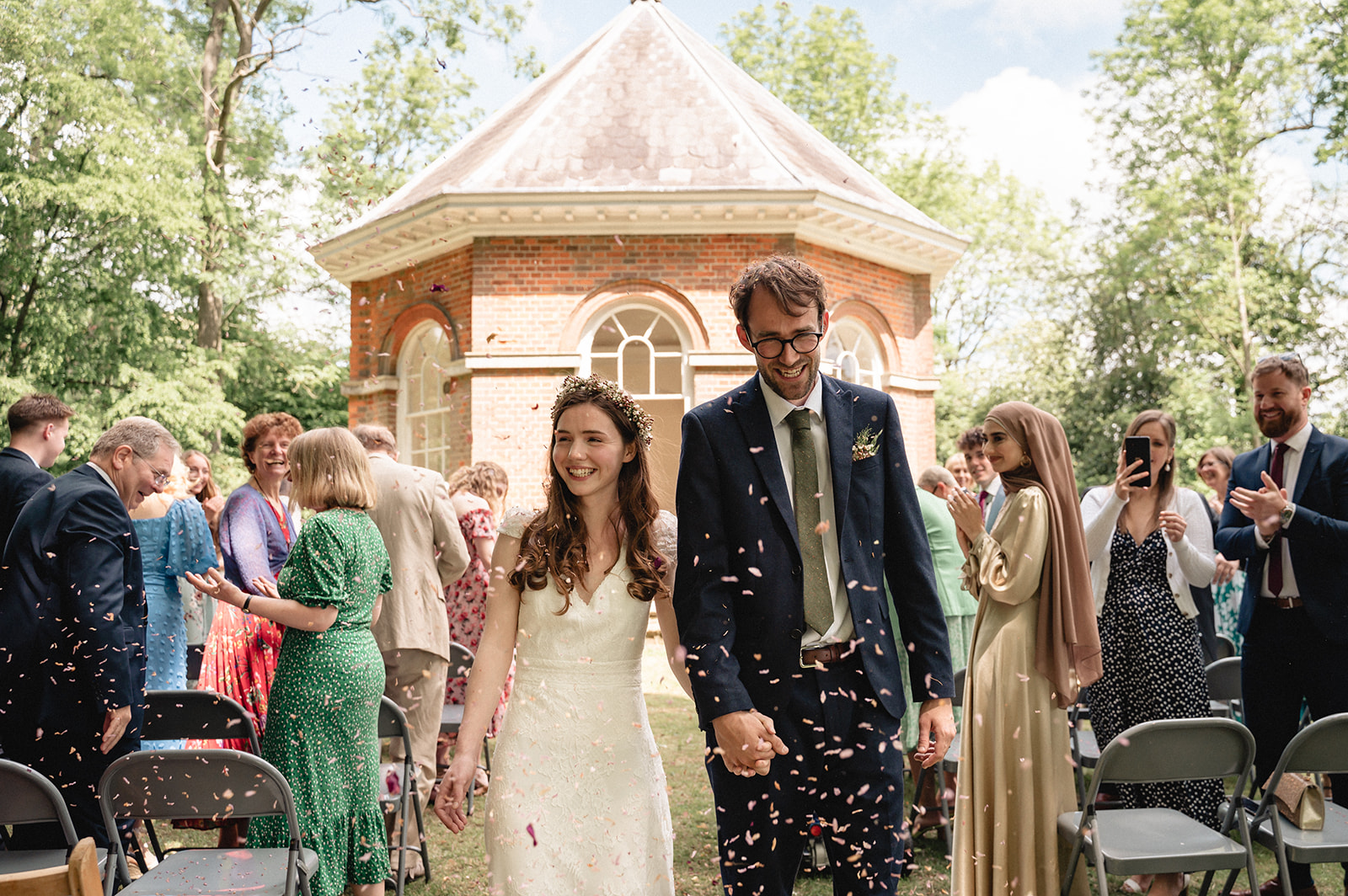 Eleanor and Hartley's  greeted with confetti toss  at the Organ House at St. Paul's Walden Bury