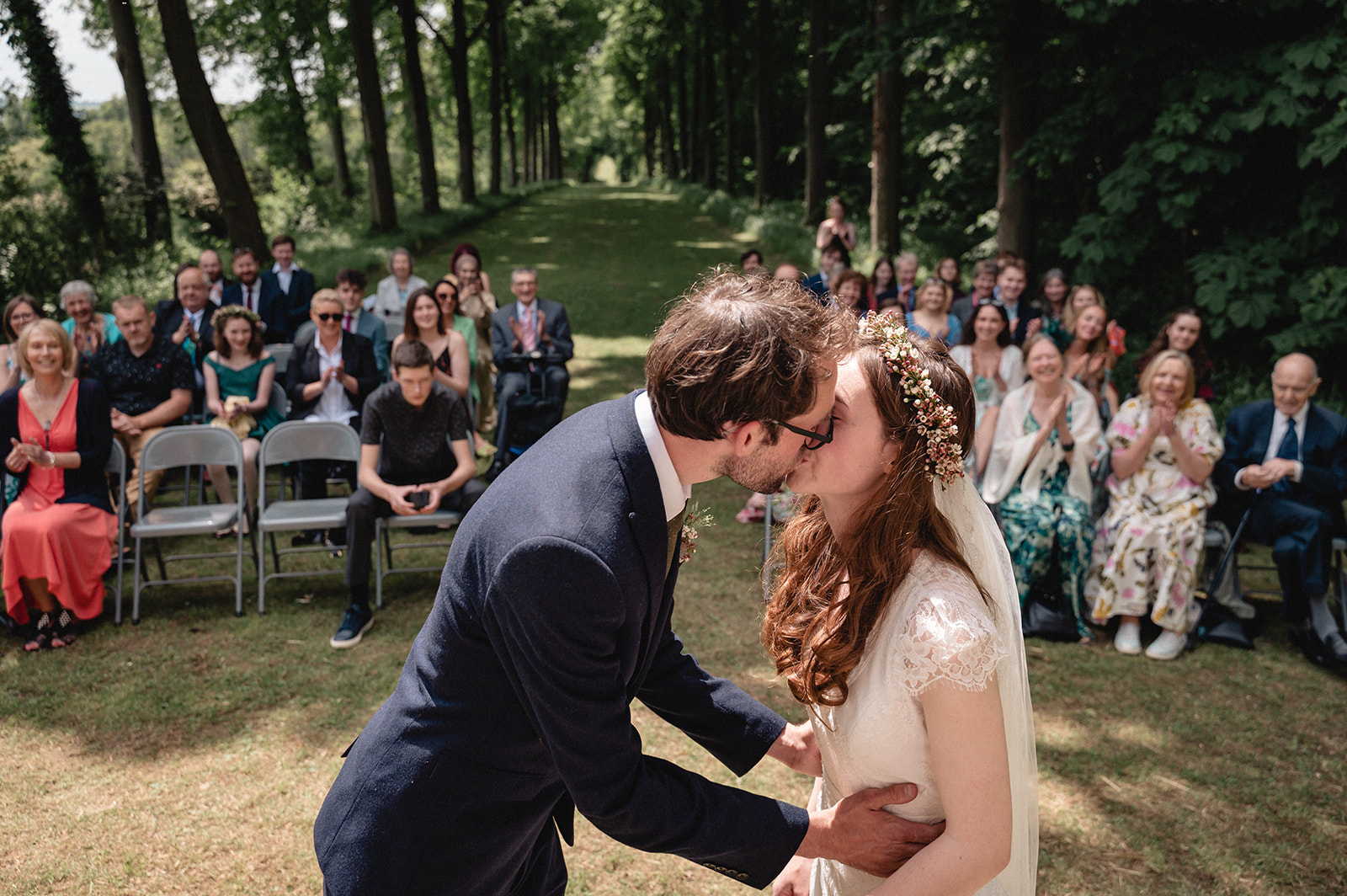 Eleanor and Hartley's  kissing during the Wedding ceremony at the Organ House at St. Paul's Walden Bury
